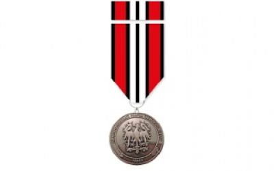 Medaile za absolvování pochodu. 